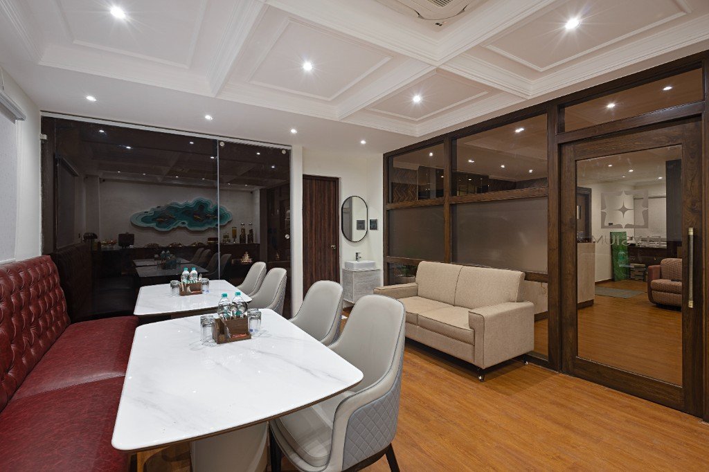 Elysium Premier Suites, Hitec City — Dining area with glass partition