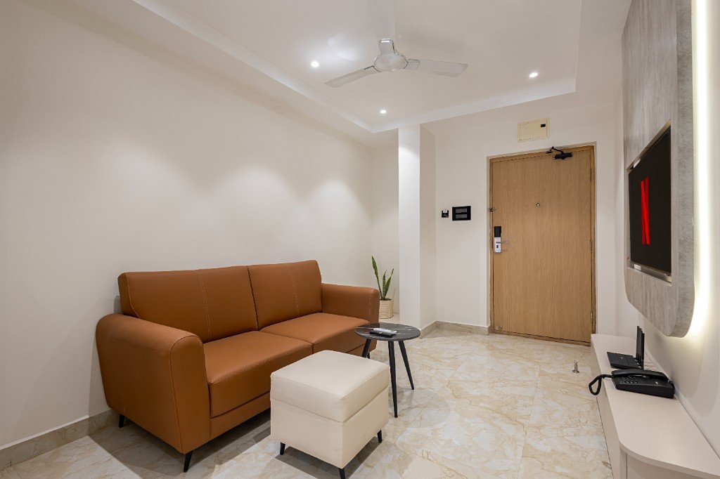 Elysium Premier Suites, Hitec City — Suite entrance and living area